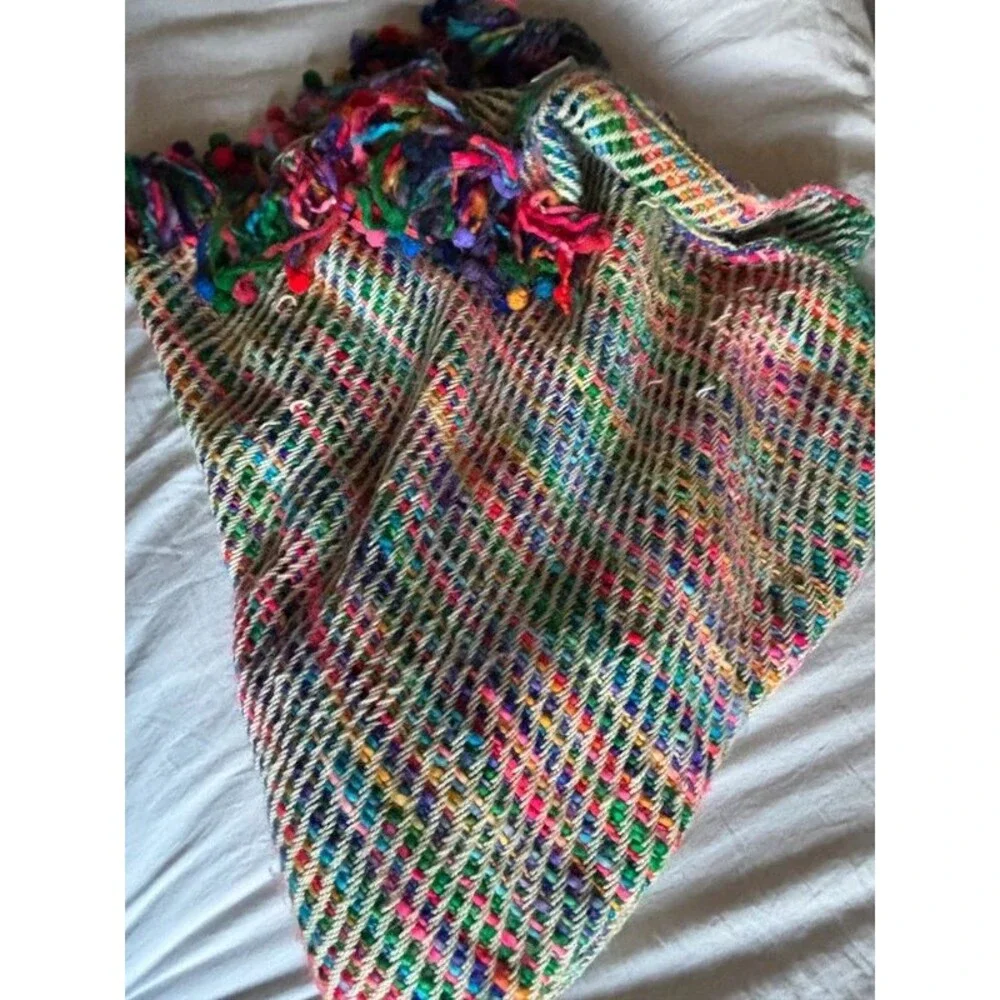 Colorful woven throw blanket with tassels/fringe